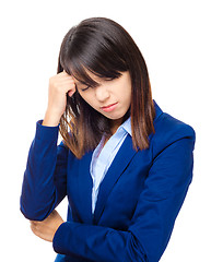 Image showing Asian business woman with serious headache