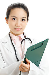 Image showing Asian woman doctor with writing pad