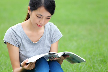 Image showing Asian woman reading book