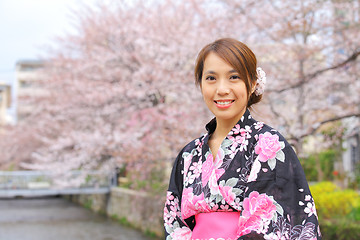 Image showing Japanese woman wearing kimono with cherry blossom