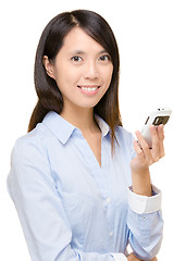 Image showing Asian woman holding mobile