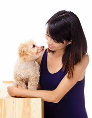 Image showing Asian woman with poodle
