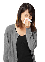 Image showing Cold sneezing asian woman