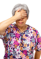 Image showing Mature asian woman feel headache