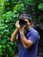 Image showing Asian male photographer