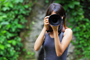 Image showing Asian woman taking photo