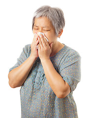 Image showing Sneezing asian elderly woman