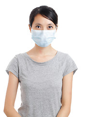Image showing Asian woman with face mask isolated on white