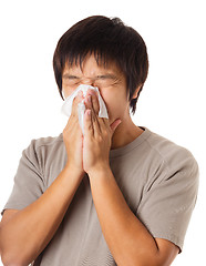 Image showing Sneezing asian man