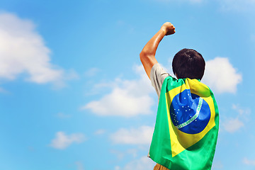 Image showing Excited man holding brazil flag