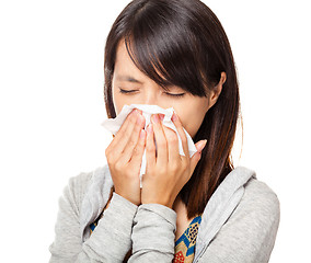 Image showing Sneezing woman isolated over white background