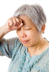 Image showing Mature asian woman feel headache