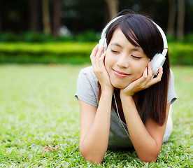 Image showing Asian woman enjoy music