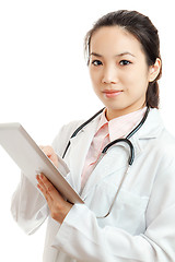 Image showing Asian female doctor with computer tablet