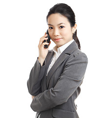 Image showing asian business woman using mobile phone