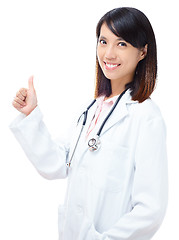 Image showing Asian female doctor thumb up