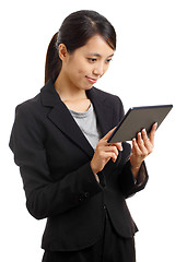 Image showing Asian business woman using tablet pc