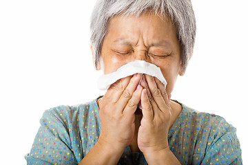 Image showing Asian old woman sneezing