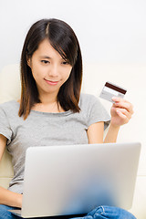 Image showing Asian woman using laptop for online shopping
