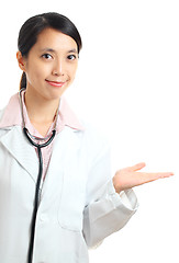 Image showing Asian female doctor introduce something