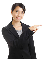 Image showing Asian woman pointing 
