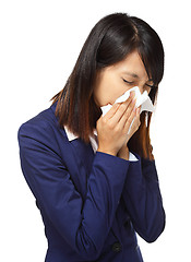 Image showing Cold sneezing asian business woman