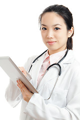 Image showing Asian female doctor with digital tablet