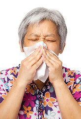 Image showing Sneezing asian woman