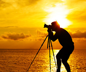 Image showing Silhouette photographer at sunset