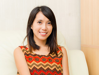 Image showing Young asian woman at home