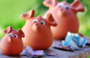 Image showing Three ceramic piggy banks