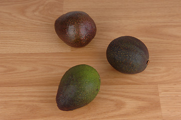 Image showing Three ripe avocado.