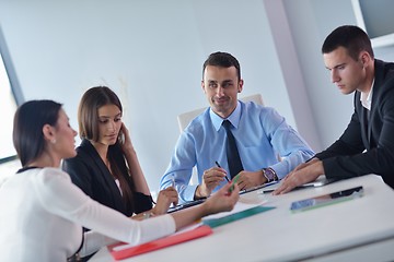 Image showing business people in a meeting at office