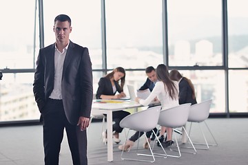 Image showing business people in a meeting at office