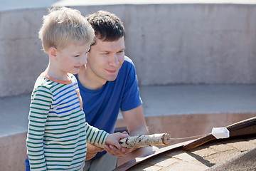 Image showing family making marshmallows