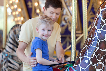 Image showing family in amusement park