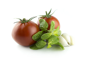 Image showing fresh tomatoes with Garlic and Mints 