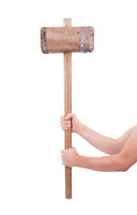 Image showing Man with very old wooden hammer isolated 