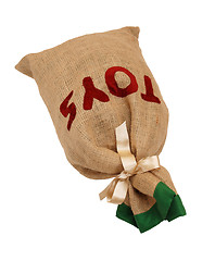 Image showing Father Christmas's hessian toy sack tied with a ribbon lying fla