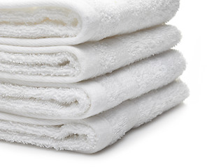 Image showing Stack of white hotel towels on a white background