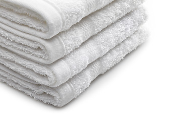 Image showing Stack of white hotel towels on a white background