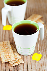 Image showing two cups of tea and crackers
