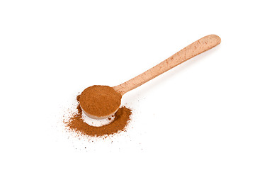 Image showing ground cinnamon in wooden spoon