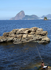 Image showing Child fishing in the sea