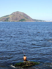 Image showing Fisherman in the sea