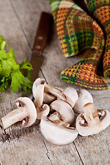 Image showing  fresh sliced champignons with parsley 