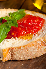 Image showing Italian fresh tomato and basil bruschetta