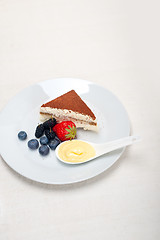 Image showing tiramisu dessert with berries and cream