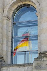 Image showing Reflection of German flag in Reichstag window