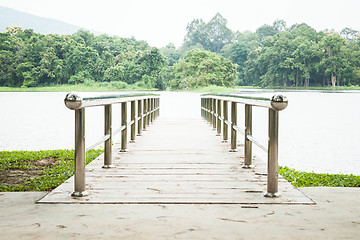 Image showing Green scenery and bridge in the park